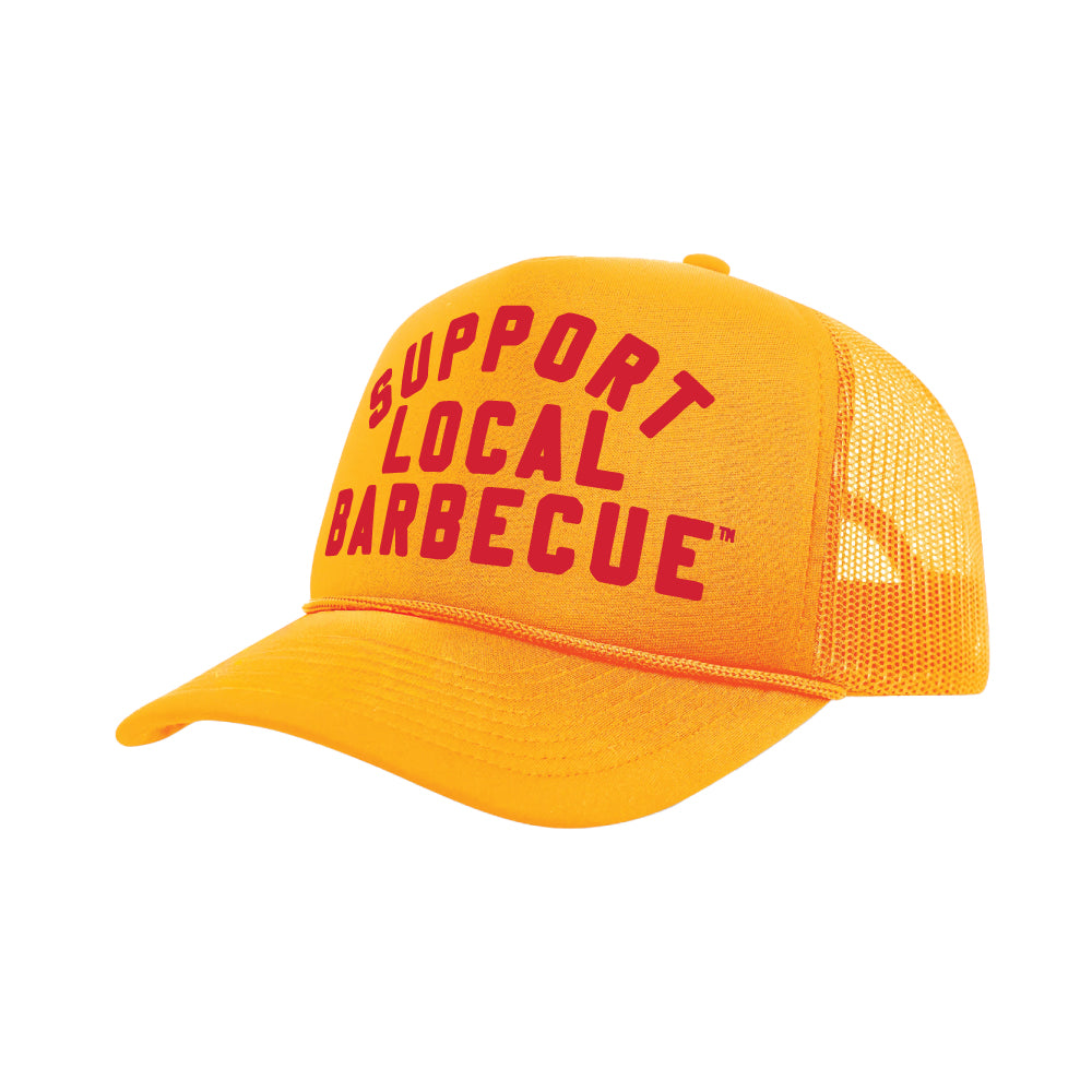 PAKO DESIGNS - SUPPORT LOCAL BARBECUE™ - TRUCKER HAT IN FOOTBALL GOLD & RED