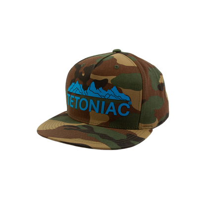 PAKO DESIGNS - TETONIAC® 5 PANEL FLAT BILL TWILL TRUCKER HAT - WOODLAND CAMO / MALIBU BLUE SILICONE