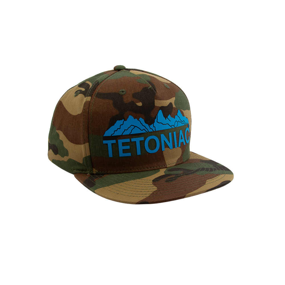 PAKO DESIGNS - TETONIAC® 5 PANEL FLAT BILL TWILL TRUCKER HAT - WOODLAND CAMO / MALIBU BLUE SILICONE