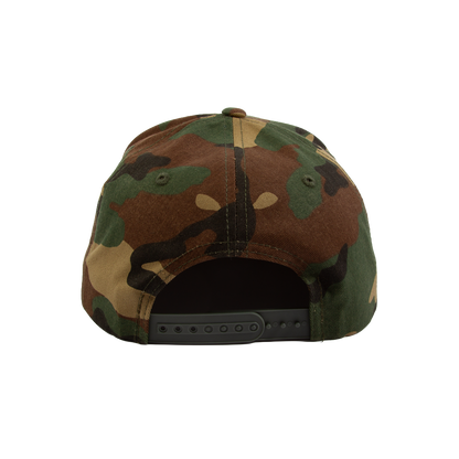 PAKO DESIGNS - TETONIAC® 5 PANEL FLAT BILL TWILL TRUCKER HAT - WOODLAND CAMO / MALIBU BLUE SILICONE