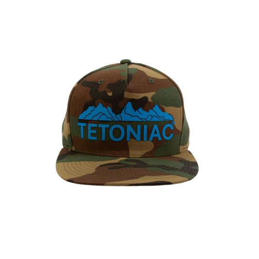 PAKO DESIGNS - TETONIAC® 5 PANEL FLAT BILL TWILL TRUCKER HAT - WOODLAND CAMO / MALIBU BLUE SILICONE